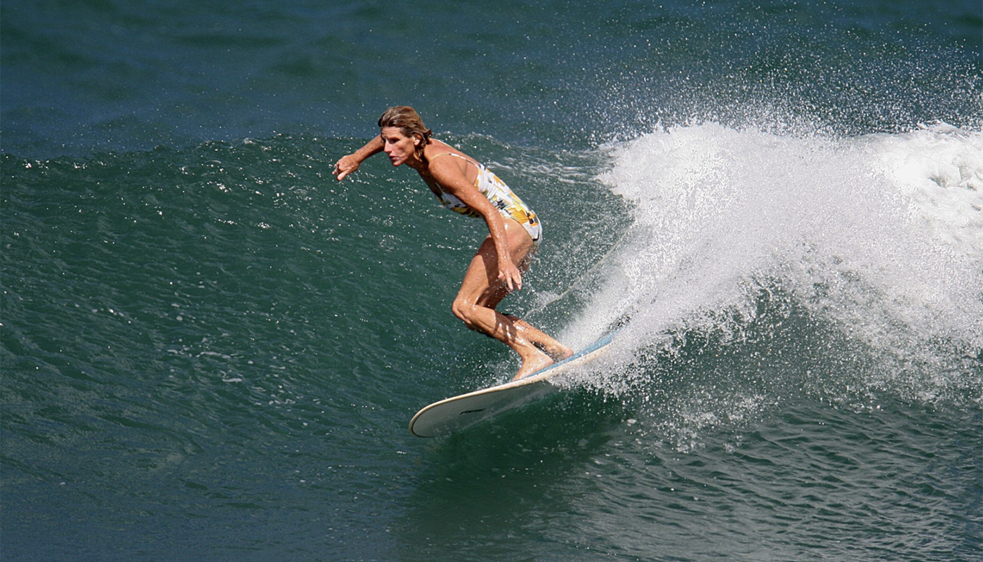 Sally Saenger surfing