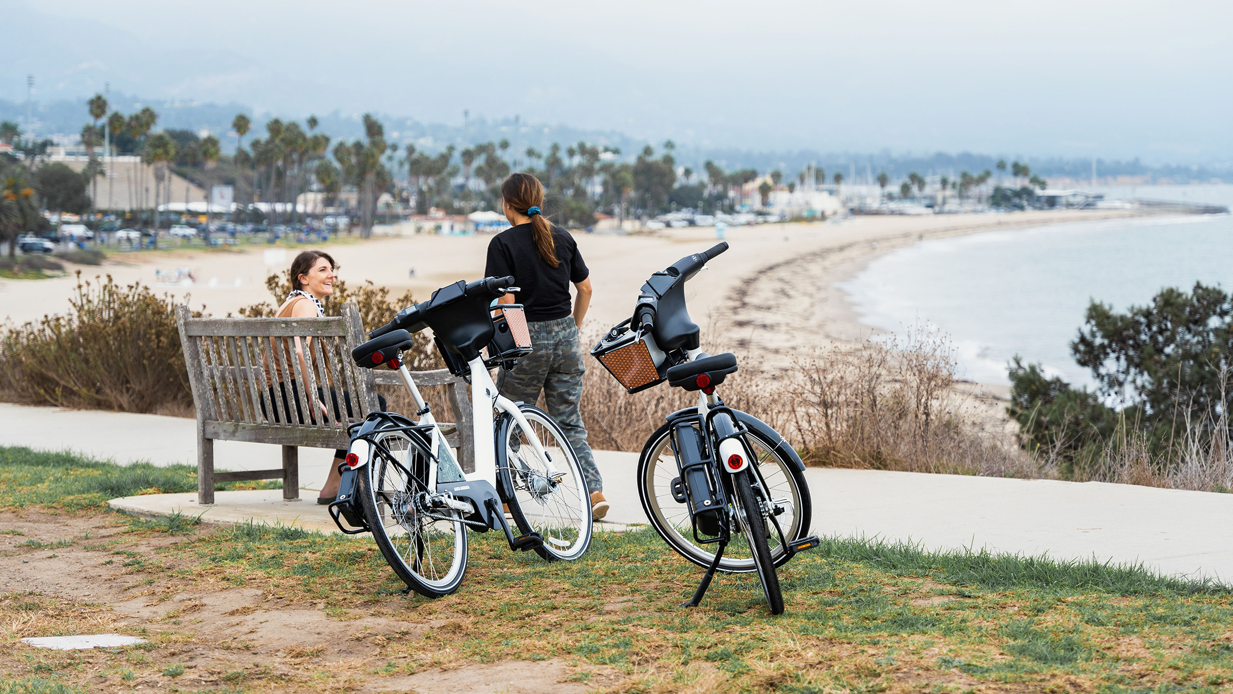 BCycle users by the beach